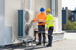 Technicians Inspecting Commercial AC