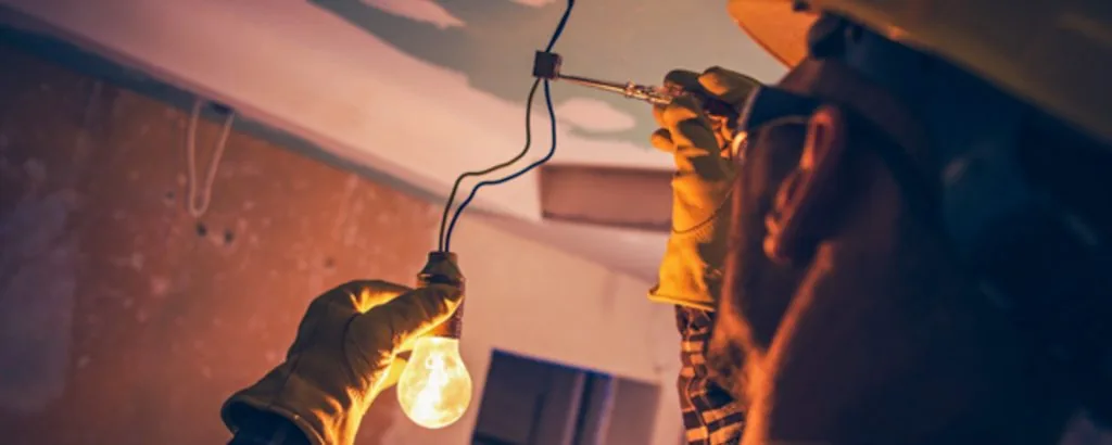 Electrician fixing the Light